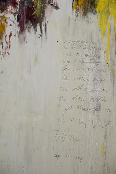 portrait-oriented Twombly painting with scrawled writing on the right-hand side and colorful paint smears at the top of thetop